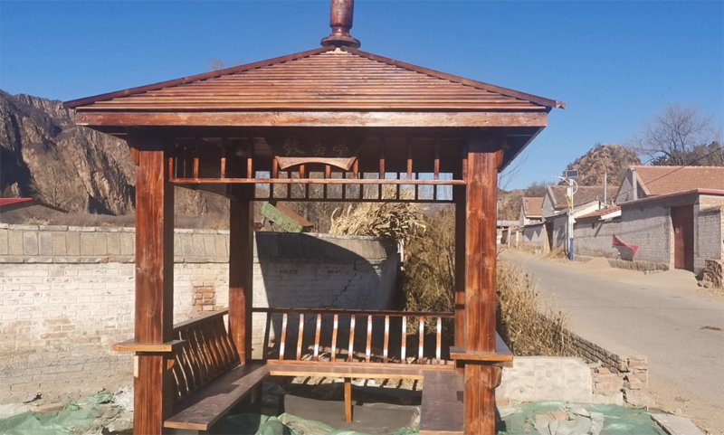 路桥公司为达志营村建起“致富亭”.png